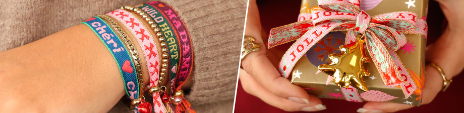 Metalen belletjes en BY31® lint met tekst Metalen belletjes en BY31® lint met tekst